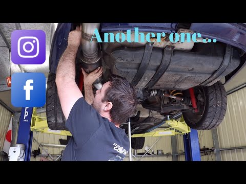 Installing a second resonator in Ethel's sweet new exhaust...