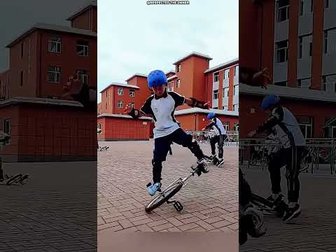 🚲🔥 После тысяч попыток этот мальчик наконец научился кататься на одном колесе!