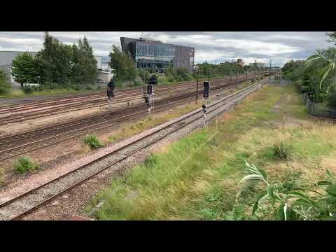Colas Class 56302 with oil tankers passes Darlington on Sinfin to Grangemouth Oil Terminal 13/07/20