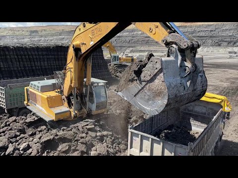 Liebherr 974 Excavator Loading Mercedes And MAN Trucks