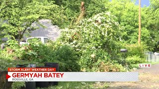 Storm causes tree to fall on home and catch fire in Rossville, Ga