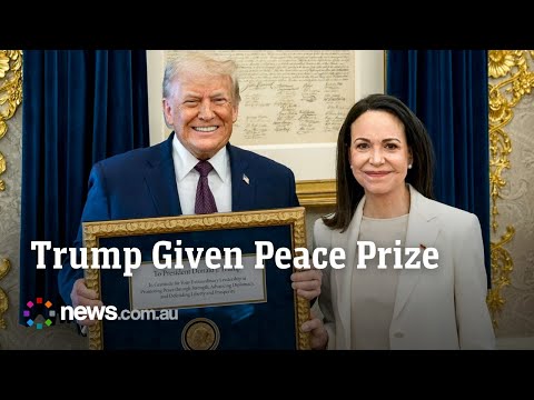 Nobel Peace Prize winner presents medal to Donald Trump in Washington