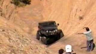 Jeep rolls on Hell's Revenge trail.  MOAB