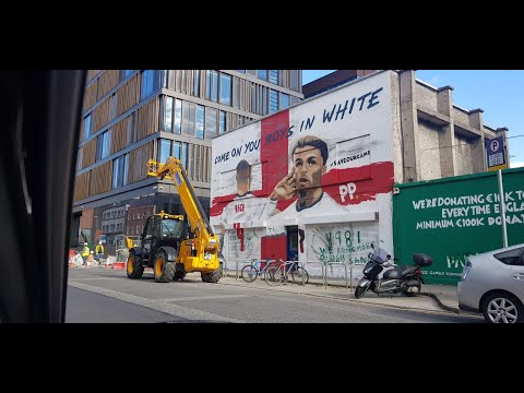 Paddy Power explains why he erected a poster of two English footballers in the center of Dublin!