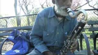 Giuseppi  Logan is no longer homeless, playing bass clarinet in need of repair, Tompkins Sq. Park