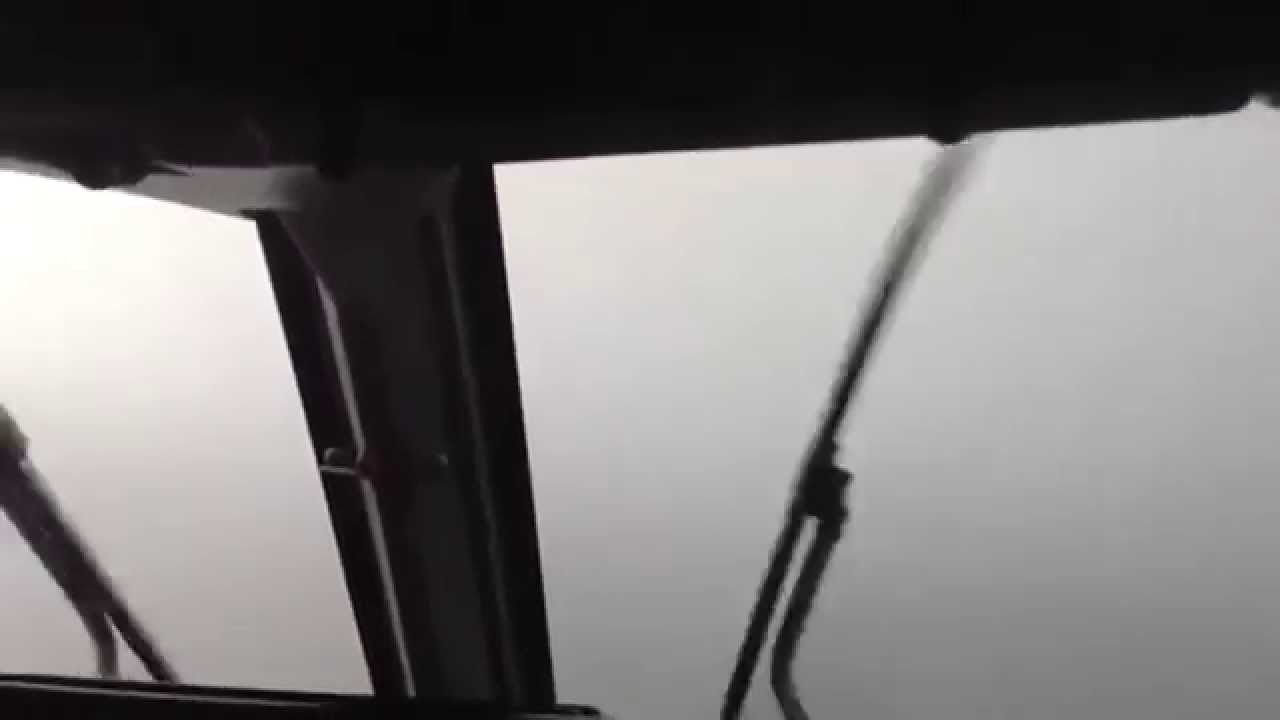 Dangerous Landing during heavy storm- Runway appears on final - Cockpit view