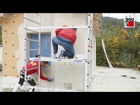 WDVS Holzfaserdämmplatten Fassade verputzen von Hand und mit Putzmaschine