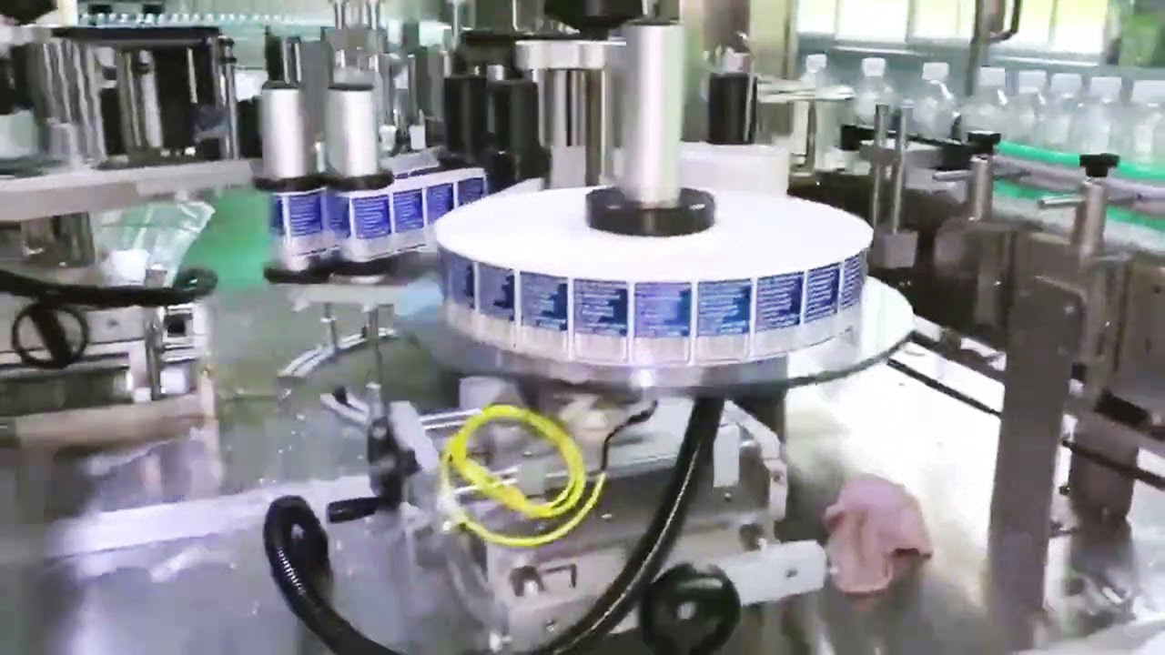 Watch video two sides sticker labeling machine high speed rotary sticker labels applicator Now two sides sticker labeling machine high speed rotary sticker labels applicator