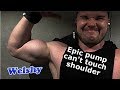 Muscle hunk pumped 20 inch arms he cant touch his shoulder