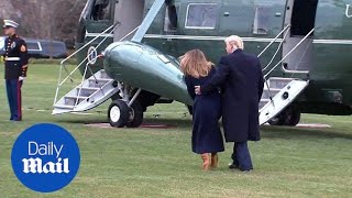 President Trump catches First Lady Melania as she stumbles