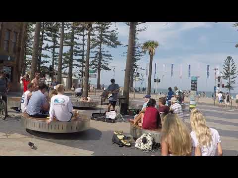 Manly Beach Street Artist Musician Australia (who is this?! Can't read his sign)