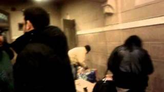 Saigon handing out blankets in Bowery Mission homeless shelter in NYC 2011