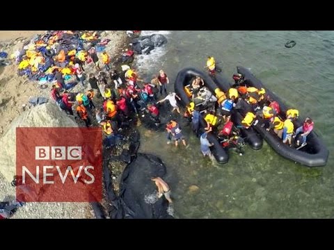 Drone video shows migrants' arrival - BBC News