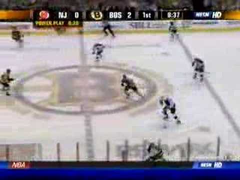 Patrice Bergeron hits Johnny Oduya 12/14/06