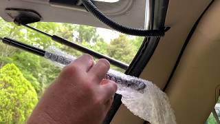 Replacing the rear glass window hatch piston spring support struts Ford Explorer 2006