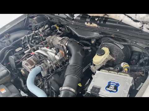 Aluminum Professional Products Typhoon intake installed on a P71 Crown Vic
