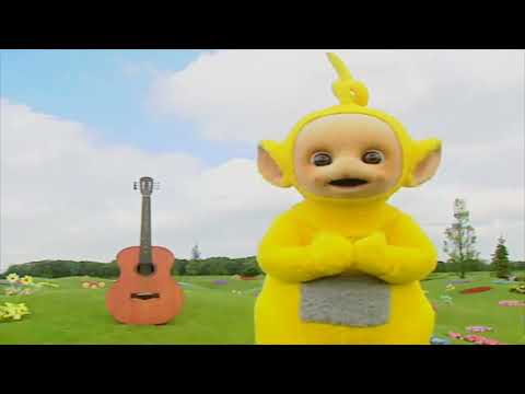 Teletubby Plays A Guitar