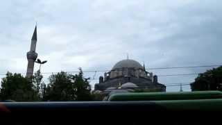 muezzin over traffic noise in istanbul