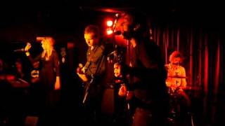 the clientele - my own face inside the trees