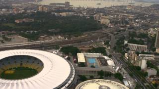 preview picture of video 'Aerial shot of city surrounding Maracanã Stadium - Rio de Janeiro, Brazil.'