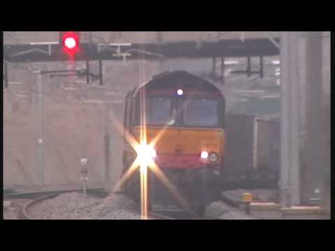 66418 on 4S49 asda train train fly's through tamworth.wmv