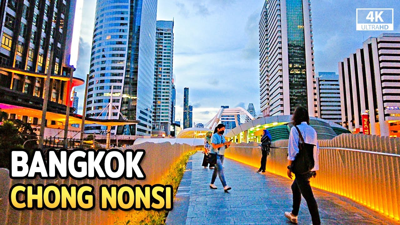 Embark on an enchanting evening stroll through Bangkok's Chong Nonsi Canal Park.