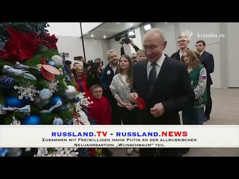 Zusammen mit Freiwilligen nahm Putin an der allrussischen Neujahrsaktion „Wunschbaum“ teil