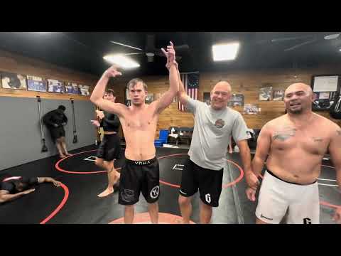 Shirtless Asian With Belly Fights Blue Belt in Jiu Jitsu