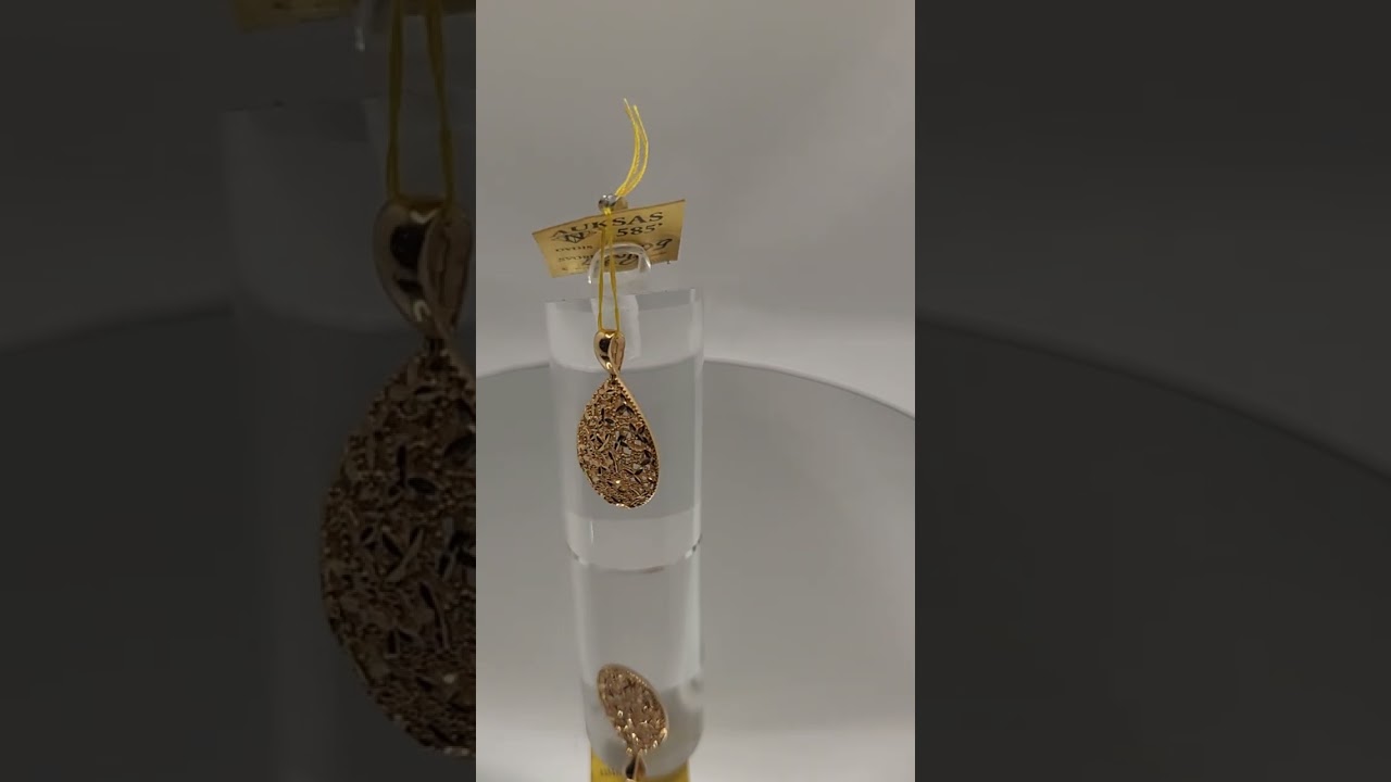 Auksinis pakabukas su graviruotu raštu Auksinis pakabukas su graviruotu raštu