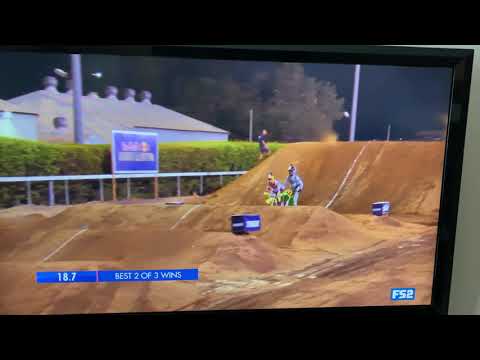 Travis Pastrana backflips during straight rhythm