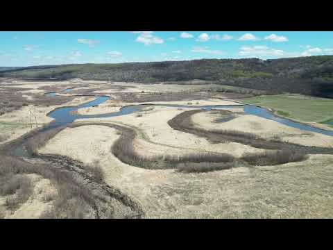 Kaposvar Creek flowing into the Qu'appelle River near Tantallon,  Saskatchewan on May 20th, 2026