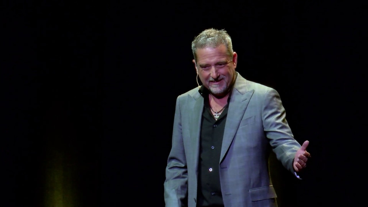 Jason Reid on stage