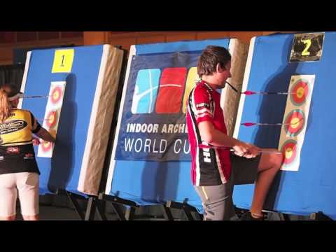 Rick van der Ven (NED) retrieving arrows for his team mate