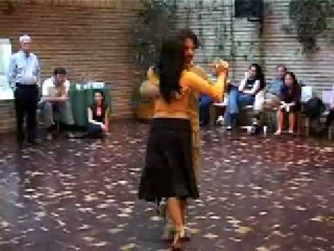  Javier Rodriguez  and  Geraldine Rojas  are  dancing  to  the  milonga  "  Milonga De Mis Tiempos  "