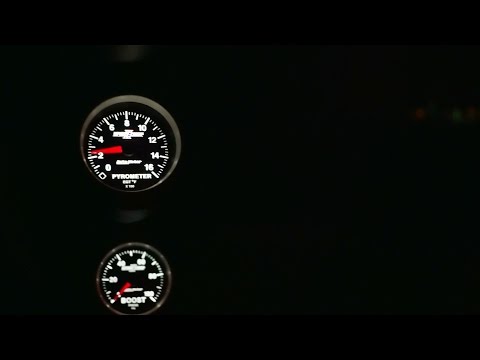 chevy cummins auto meter sport comp II gauges at night