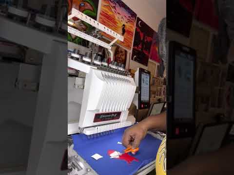 How to embroider the pocket of a reading pillow.