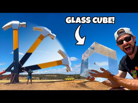 This Is What Happens When You Drop A Supersize Hammer Onto A Large Glass Cube