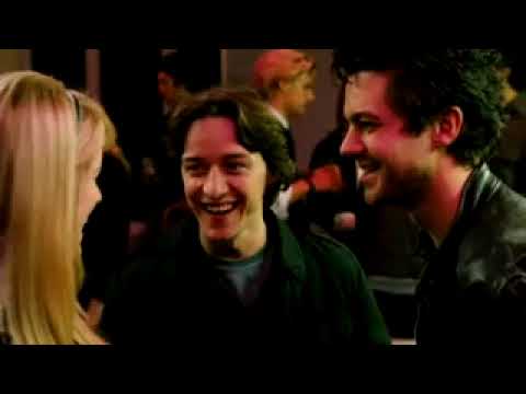 Trailer still: party sequence with strobe lights and crushes colliding