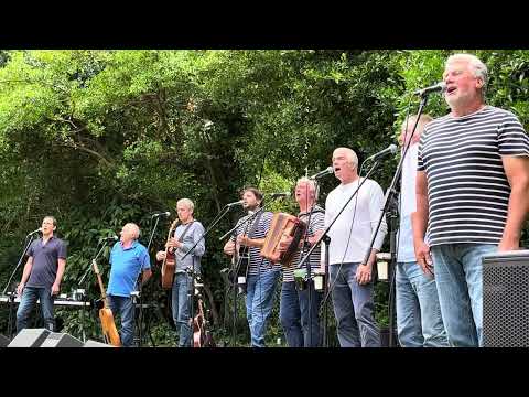 Fisherman’s Friends singing Cornwall my Home at Penlee Park 2024.