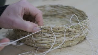 Making a basket from corn husks