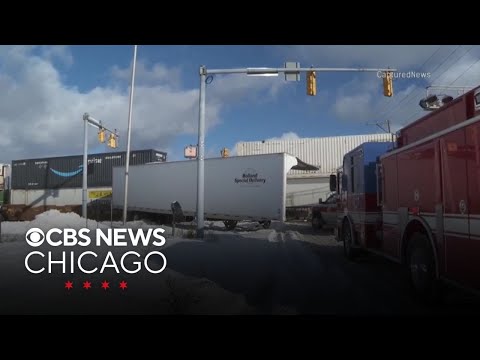 Bad weather blamed after freight train hits semi in Gary, Indiana