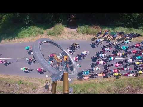 If You Can’t Beat Them, Jump Over Them: Mountain Biker Jumps Over Tour de France Race