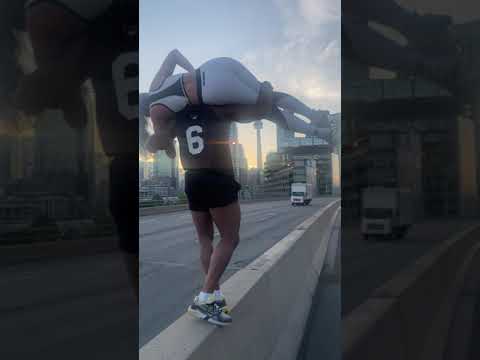MAN DOES SQUATS ON GARDNIER EXPRESSWAY IN TORONTO LIFTING A FEMALE!