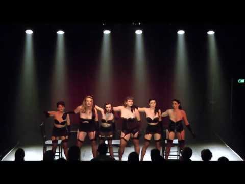Art of Tease Students perform Inhaler chair tease - Bombshell Burlesque and Beauty Academy
