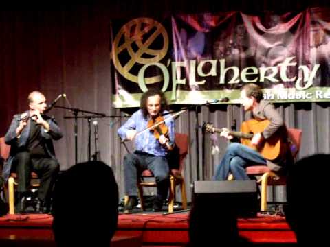 Kevin Crawford, John Doyle, and Martin Hayes playing at O'Flaherty's concert