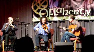 Kevin Crawford, John Doyle, and Martin Hayes playing at O'Flaherty's concert