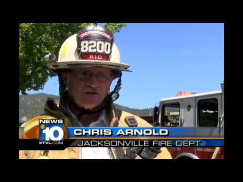 Firefighters rescue elderly woman from flames