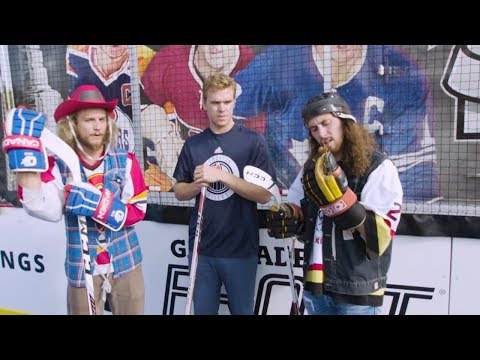 Connor McDavid accepts the inaugural On the Bench 'Grape Challie'