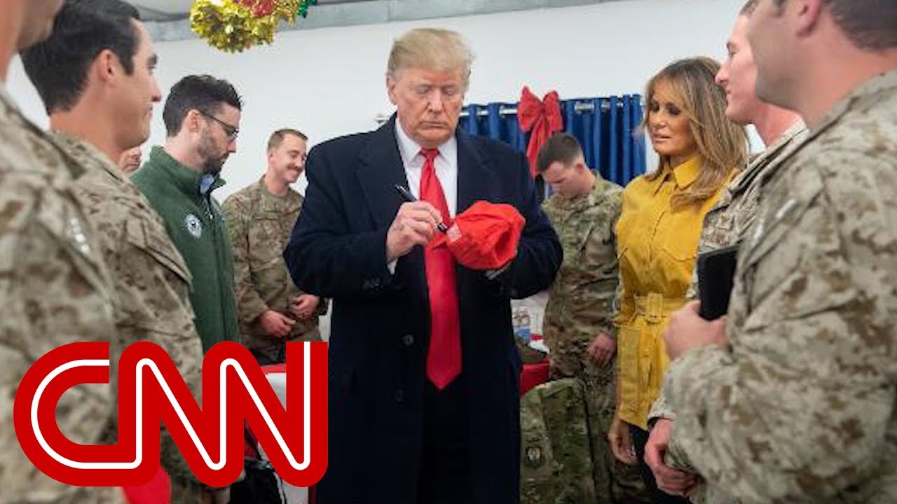 Troops' signed hats may violate military rule - YouTube