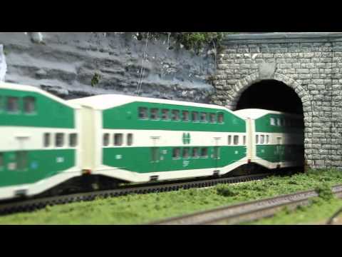 Go-Train HO Scale with 9 Cars and 2 Engines